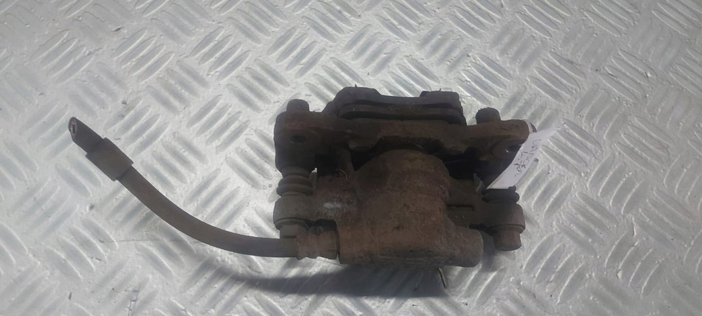 фото №4, Mitsubishi lancer viii x супорт гальмівний лівий задня