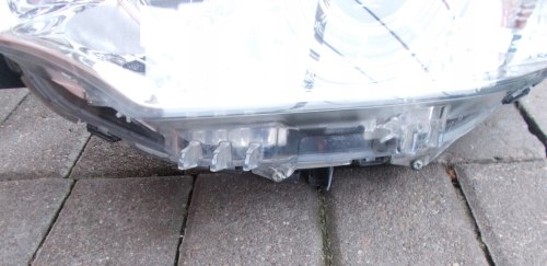 фото №7, Mitsubishi pajero sport l200 лінза h7 ліва передня лампа оригінал