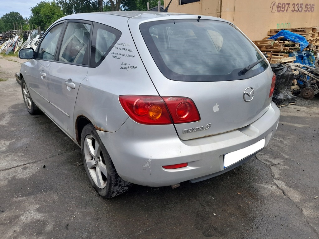 фото №12, Mazda 3 лампа левый задняя левая задняя крышка багажника крышка