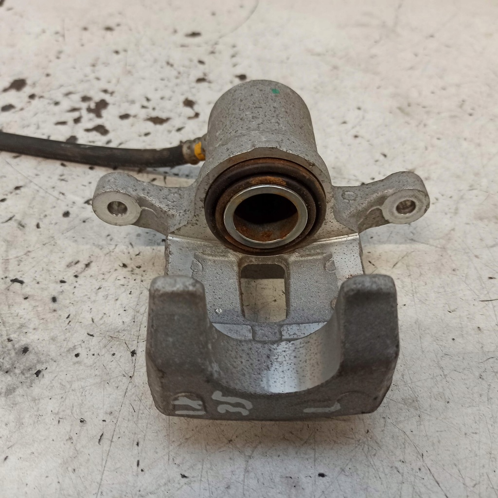 фото №10, Hyundai ix35 суппорт тормоза левый nowe 58210-2y310