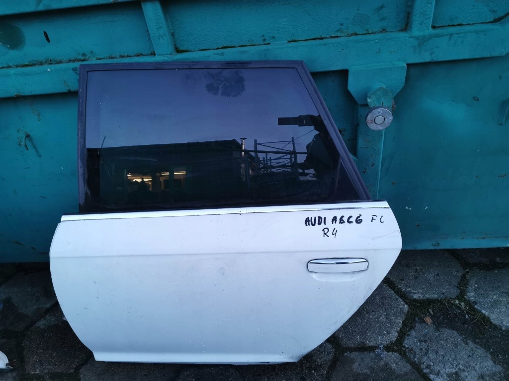 Audi a6c6 fl дверь левое  задняя Цена