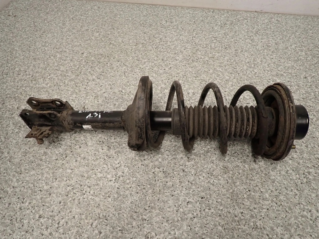 фото №1, Liana 01-07 амортизатор задний левый