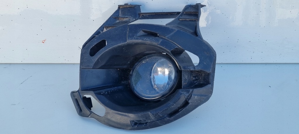 фото №1, Renault clio 3 lift решётка na противотуманная фара перед кронштейн правое