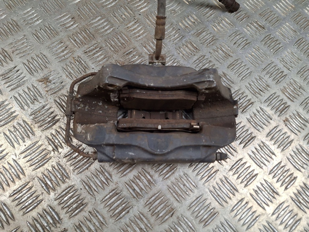 Купить Суппорт тормозной задний задний  сторона левая tesla model s 600643400c