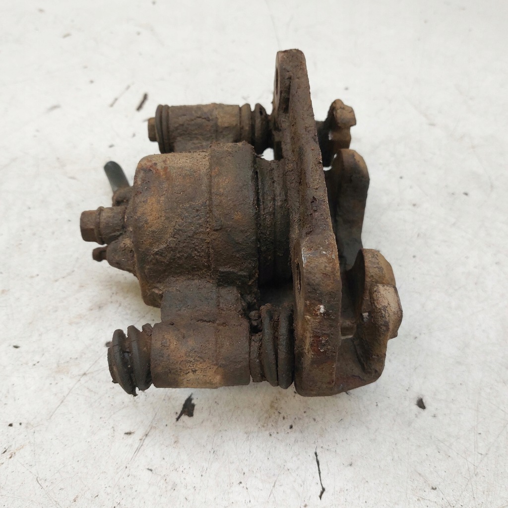 фото №12, Suzuki jimny суппорт тормозной левый перед