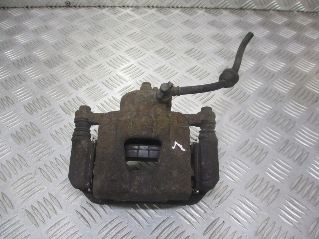 фото №1, Супорт гальмівний лівий перед chevrolet aveo t200