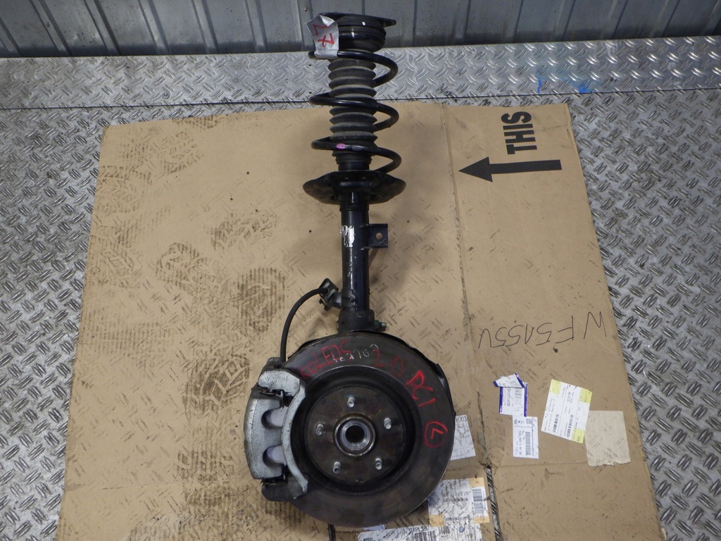 фото №1, Амортизационная стойка поворотный кулак левый перед 2.0 dci koleos ii