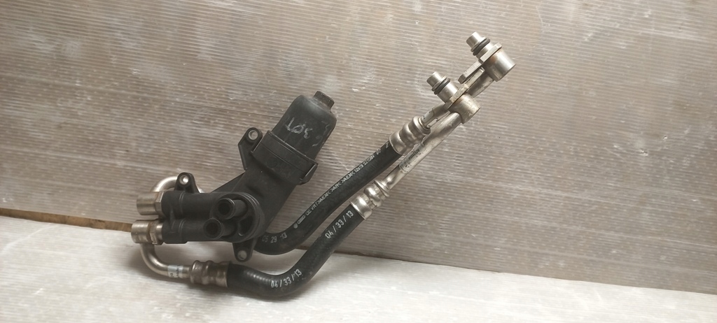 Корпус патрубок фільтр оливи коробка передач audi a6 3,0tdi Ціна