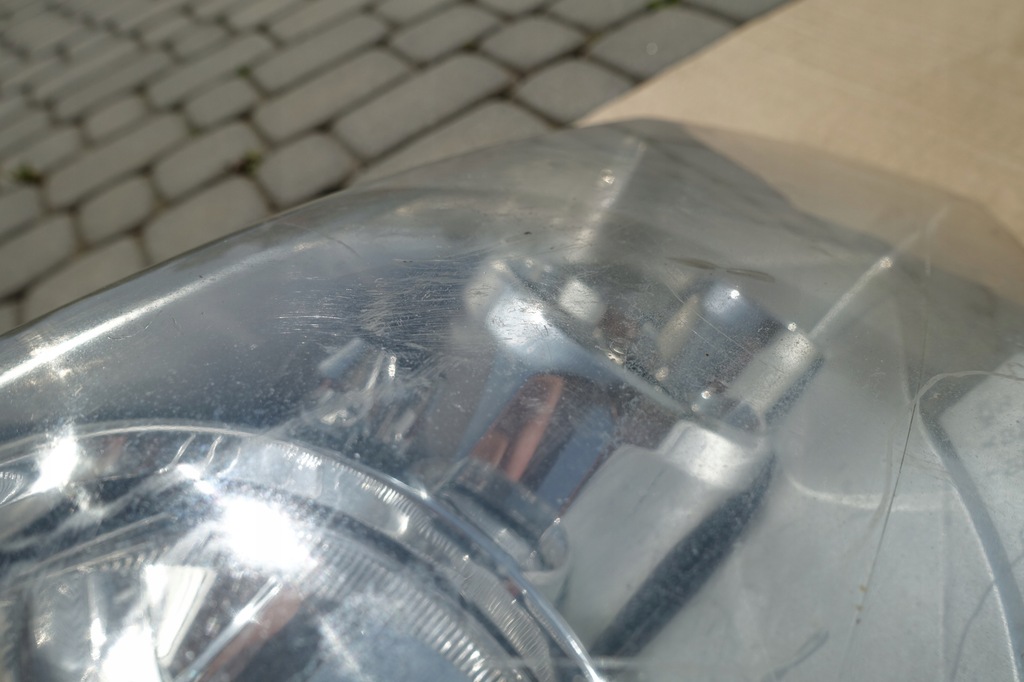 фото №8, Doge chrysler voyager country лампа передня права