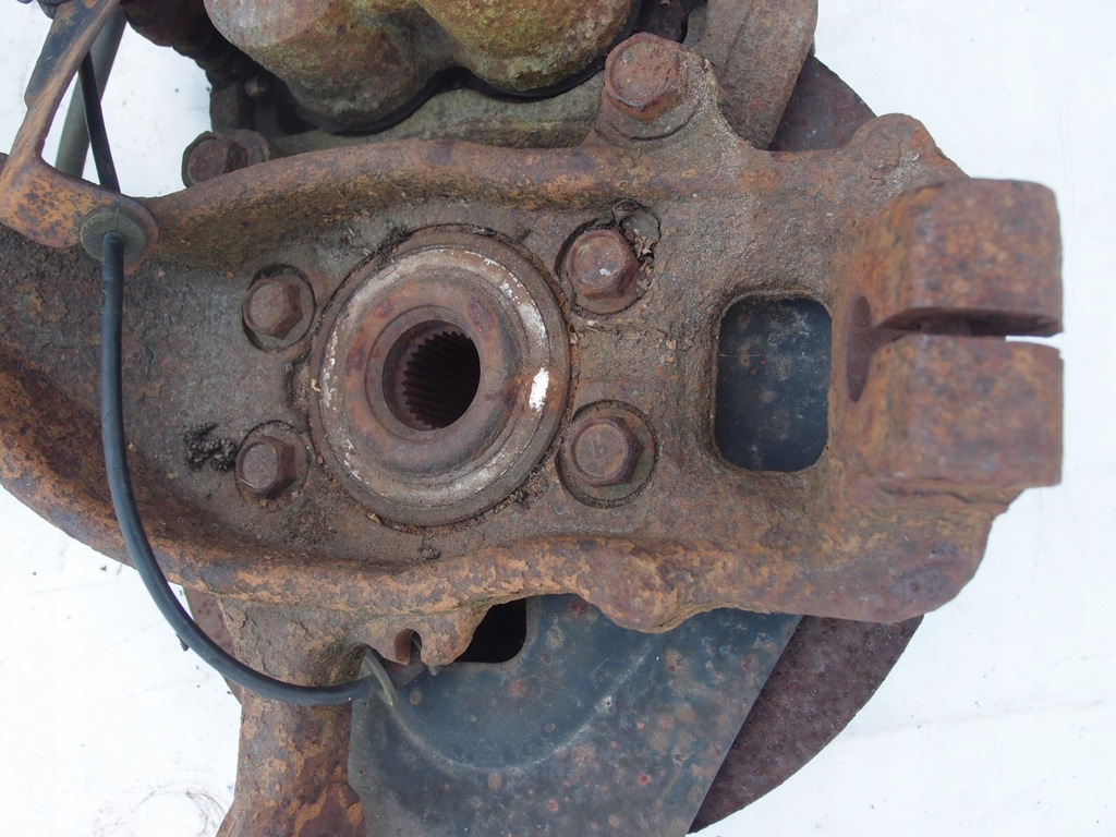 фото №11, Поворотний кулак ступиця важіль правий перед navara 2.5 dci