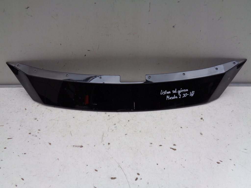 фото №1, Молдинг бампера верхний решётка радиатора mazda 2 20- lift