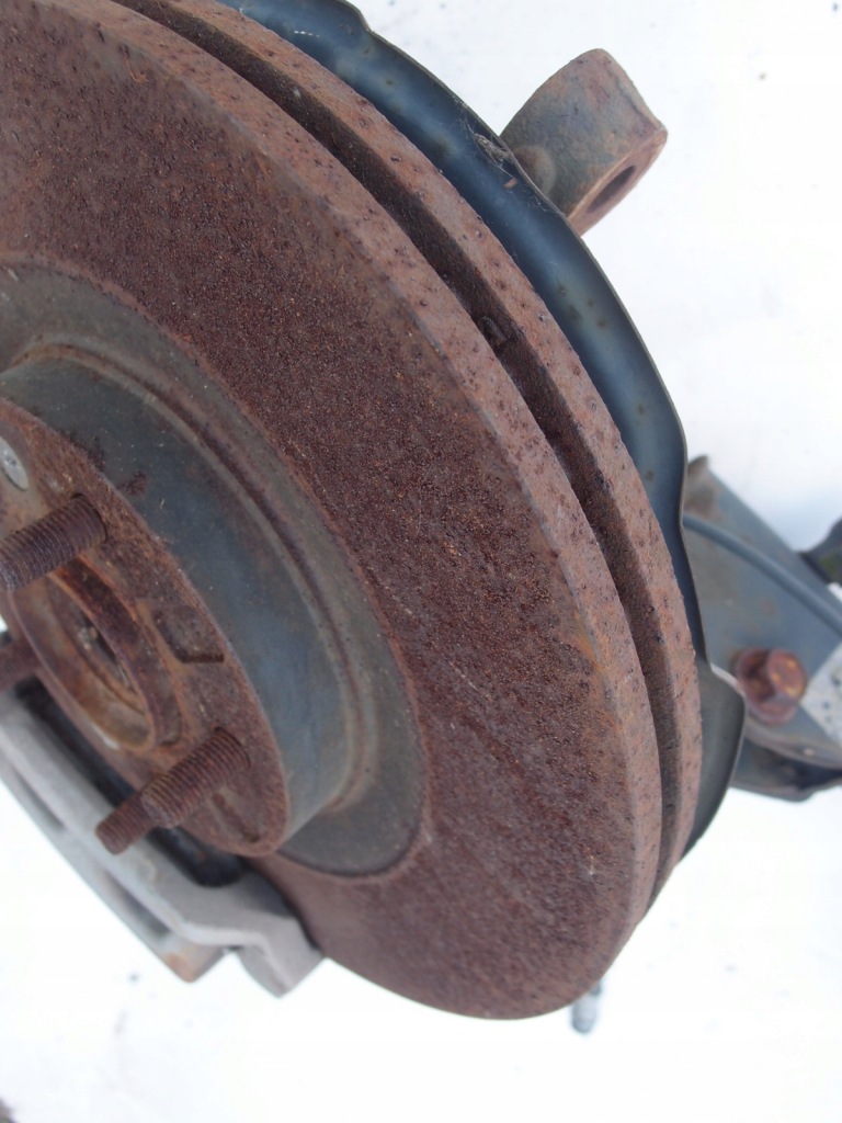 Mcperson амортизатор правая  перед mazda 3 cx-7 Оригинал