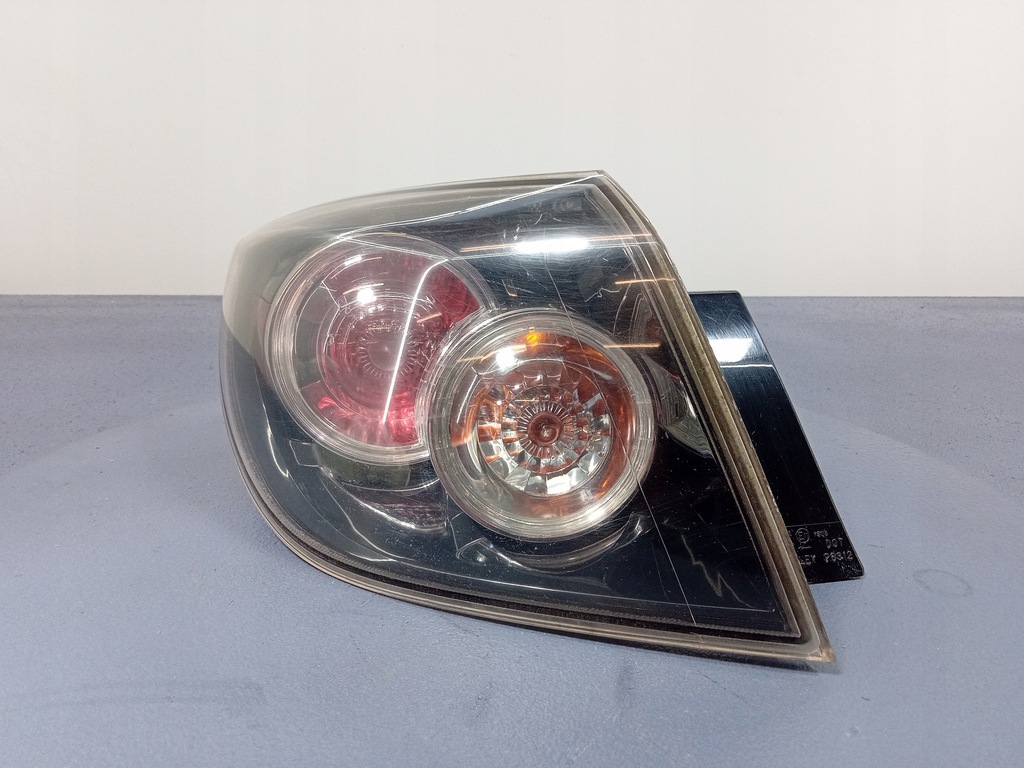 фото №1, Mazda 3 i bk hb лампа задня ліва зовнішня p6312