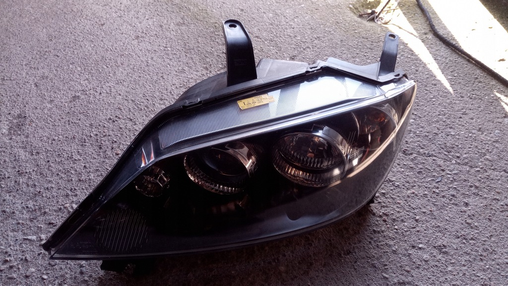 фото №1, Mazda 2 лампа ліва 05-07 лінза