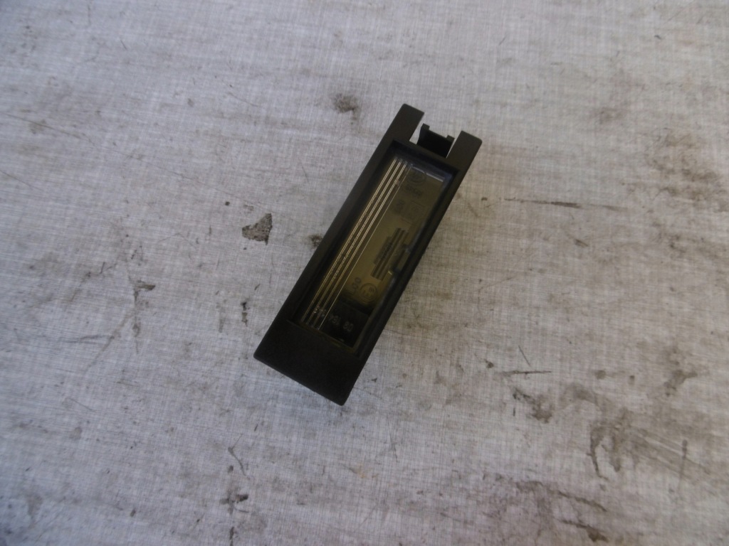 фото №1, Opel corsa c освещение номерного знака nowe opel оригинальный номер 9164143