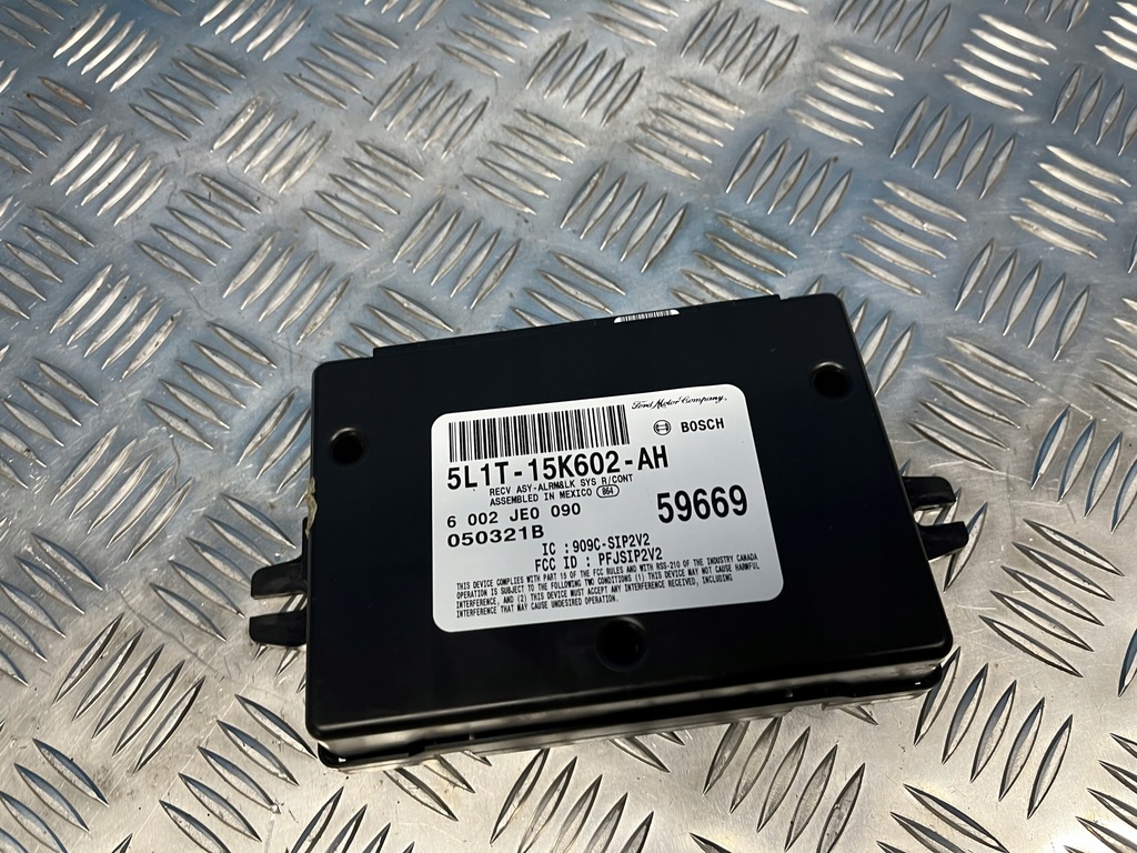 фото №1, Lincoln navigator ii 03- модуль замка центрального