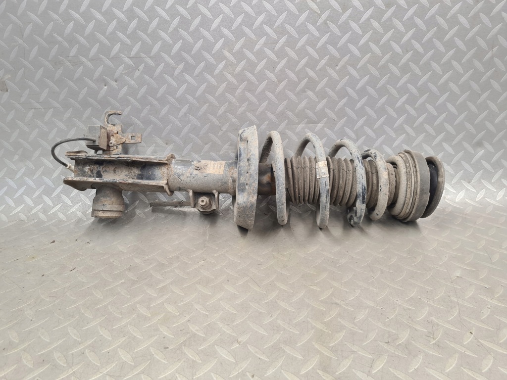 Купить Амортизатор левый перед оригинал opel 13319741