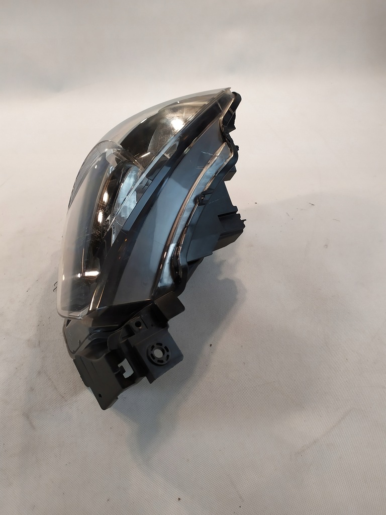 фото №7, Mazda оригинальный номер db5j-51030 лампа фара