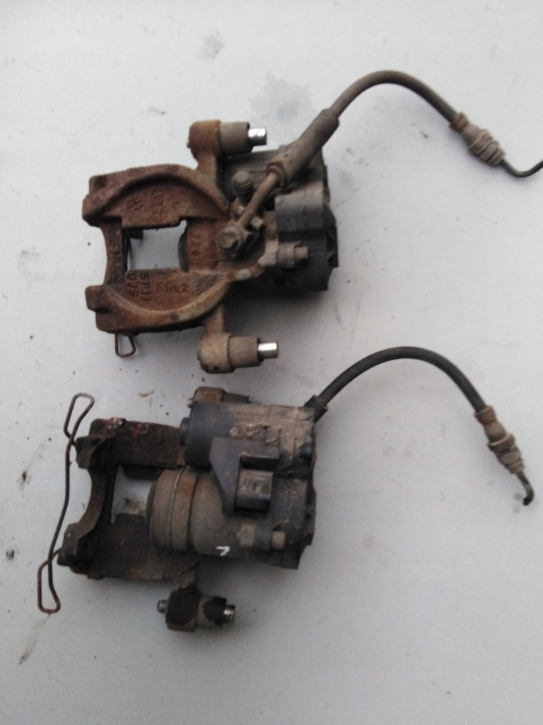 фото №1, Vw golf vii суппорт тормозной задняя левый