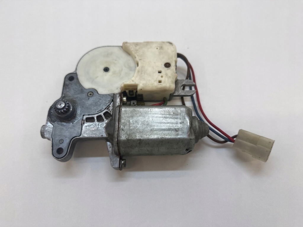 Б/у оригинальный моторчик люк alfa romeo 75 725686715 Недорого