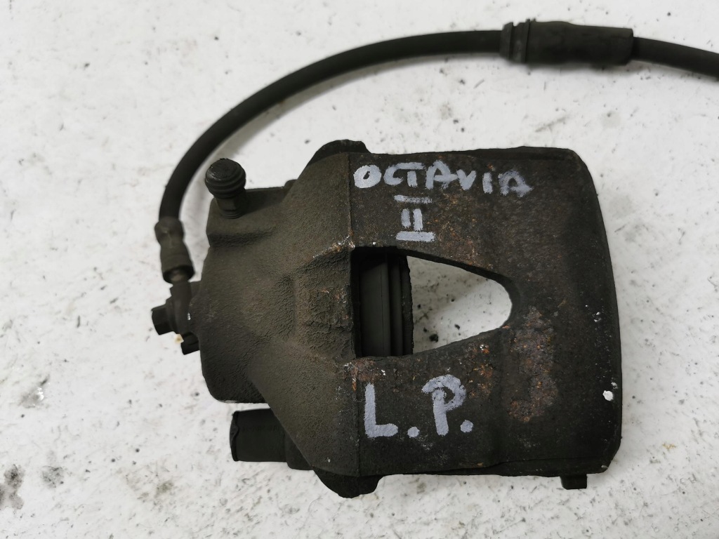 фото №3, Супорт гальмівний лівий перед skoda octavia ii lift