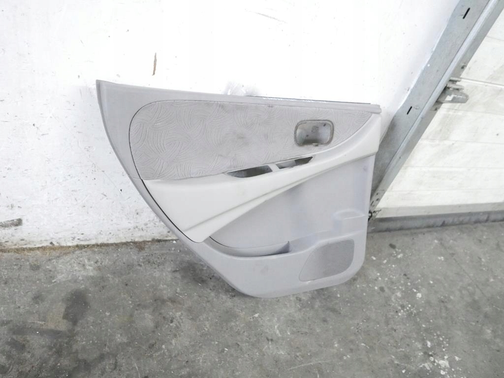 фото №5, Оббивка обшивка лівий задня nissan almera tino 00-03