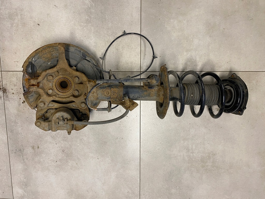 фото №7, Nissan leaf i поворотный кулак амортизационная стойка левый перед