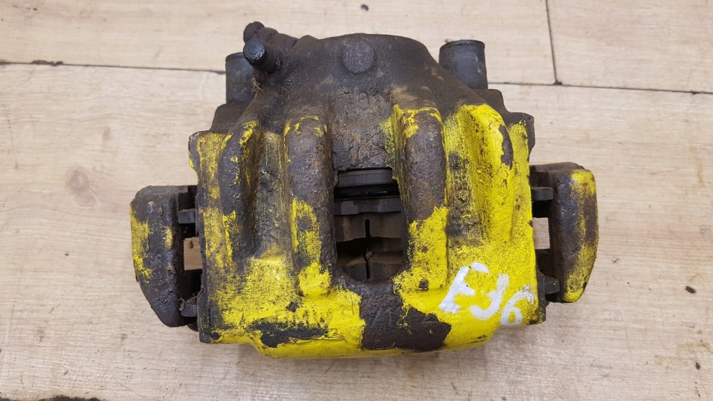 Купить Суппорт тормозной перед левый bmw e36