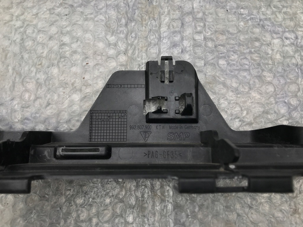 фото №8, Porsche 911 992 кронштейн напрямна бампера задня 19-