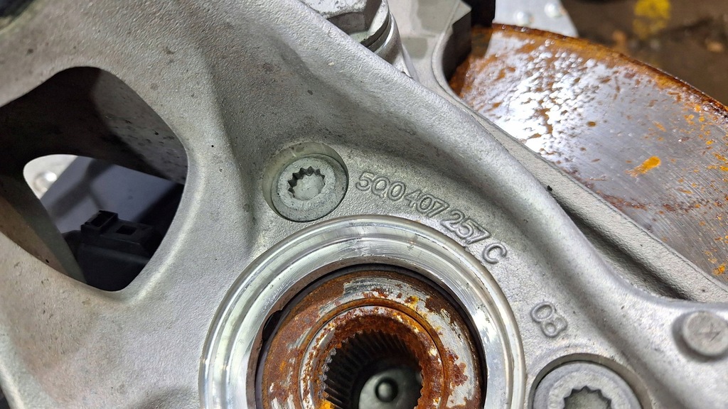 фото №9, Поворотний кулак амортизатор лівий перед 5q0407257c vw t-roc audi q3 ii 83a arteon