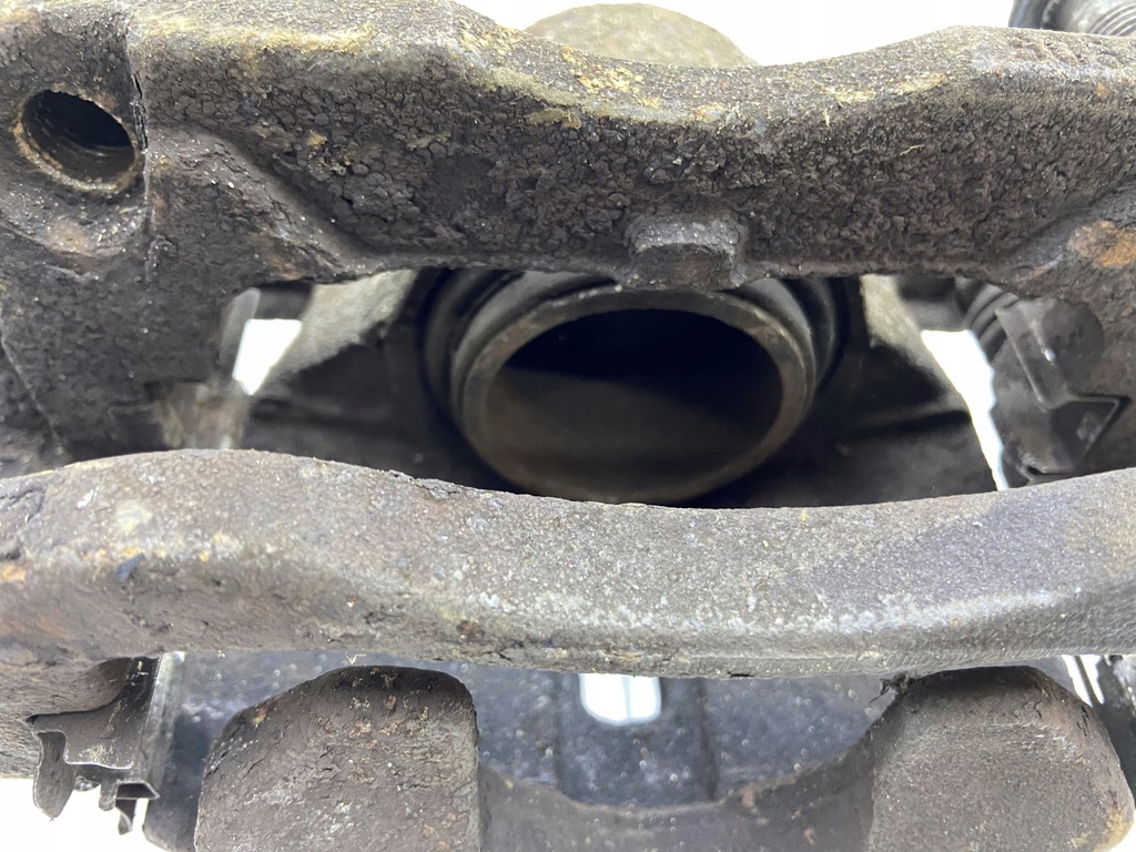 фото №7, Суппорт скоба тормоза правый перед qashqai j10 1.5 dci