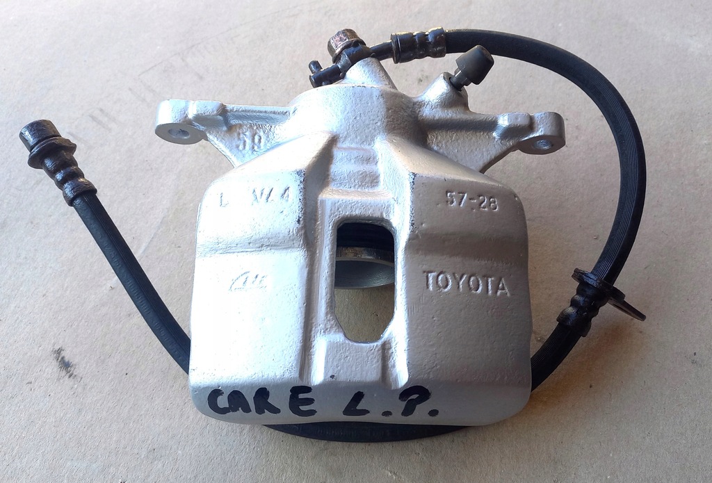 фото №1, Toyota carina e 92-07 супорт гальма перед лівий