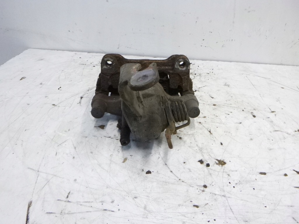 фото №4, Супорт гальмівний задня правий nissan primera p12 1.8 02-07r. kombi