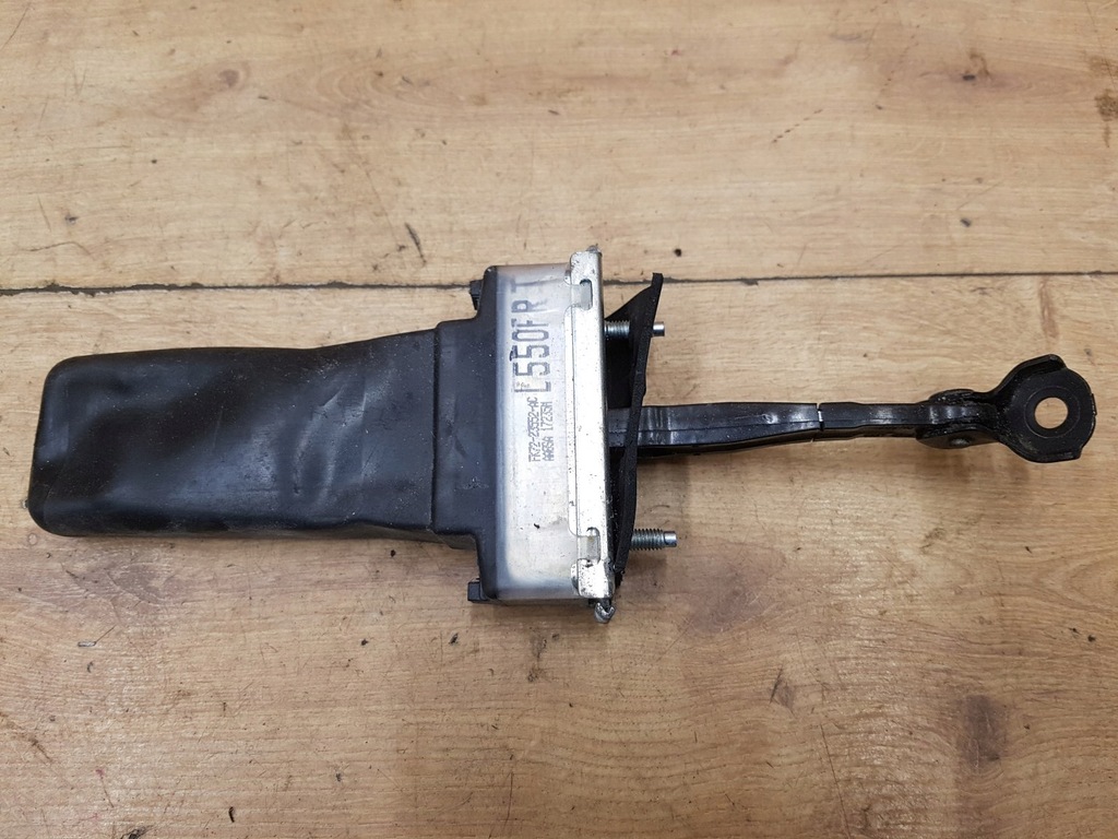 фото №1, Обмежувач двері перед land rover discovery