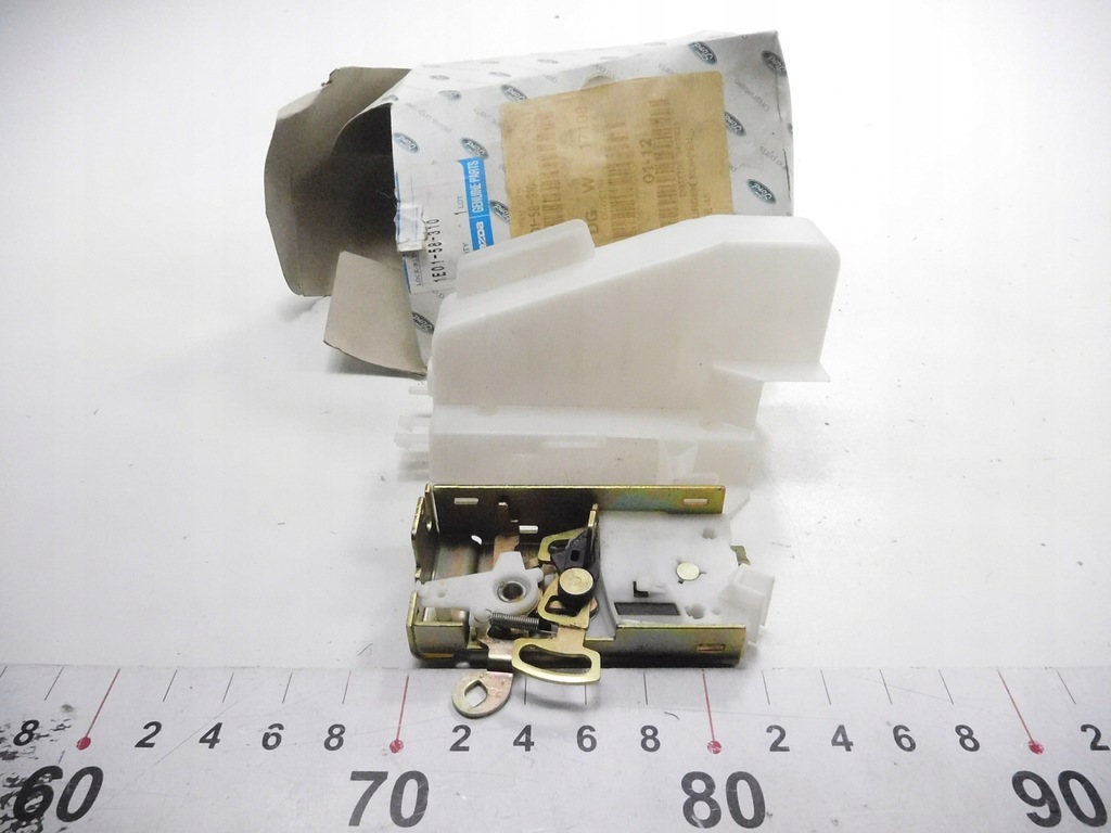 фото №8, Замок двері правий перед mazda 121 оригінальний номер 1e01-58-310