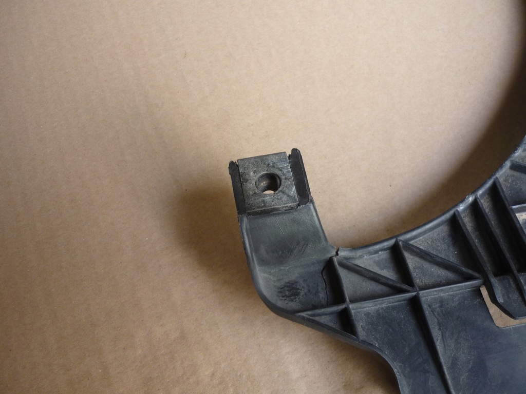 фото №9, Напрямна кронштейн лампи лівий перед audi a4 b6 valeo