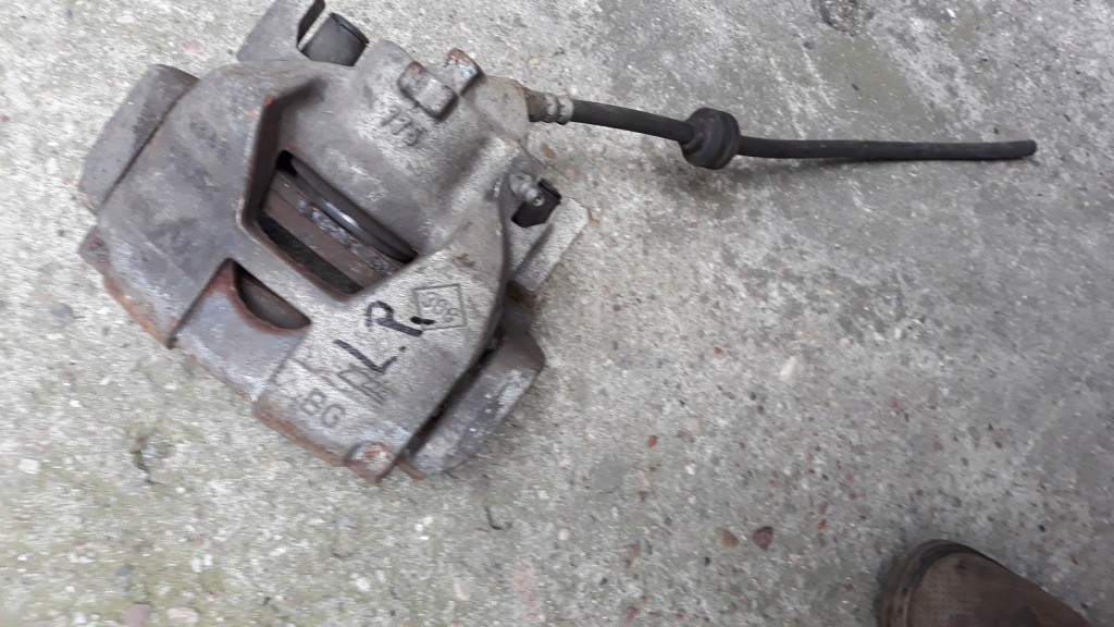 фото №1, Scenic iii суппорт тормоза левый перед