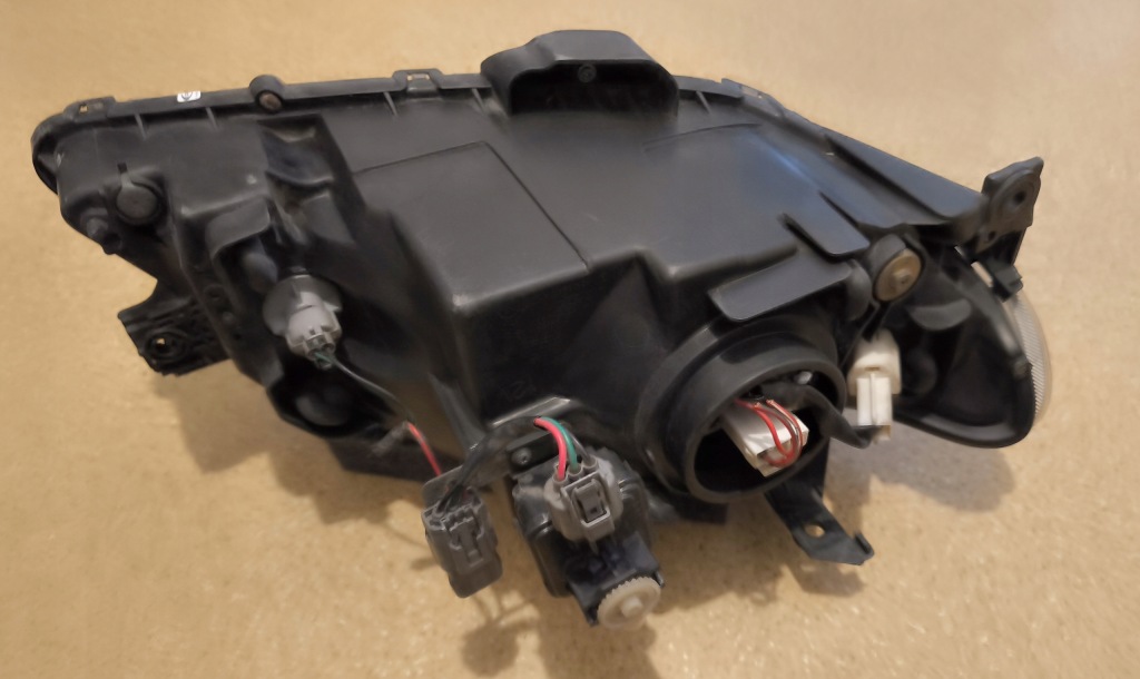 Mazda 323f bj рестайлінг  фара лівий 176 Зі Шроту