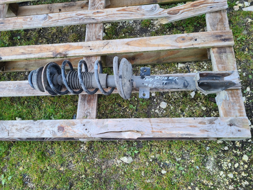 фото №1, Dacia duster i 4wd амортизатор пружина левый задняя