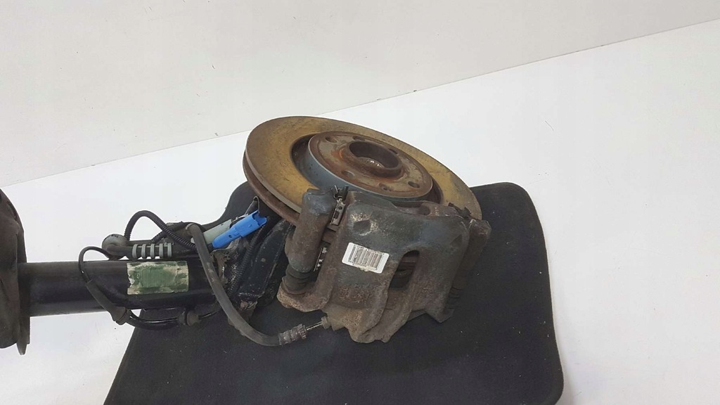 фото №6, Peugeot 301 1.6 поворотный кулак амортизатор левый перед