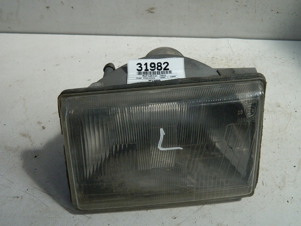 фото №1, Jeep cherokee grand фара левый лампа перед 93