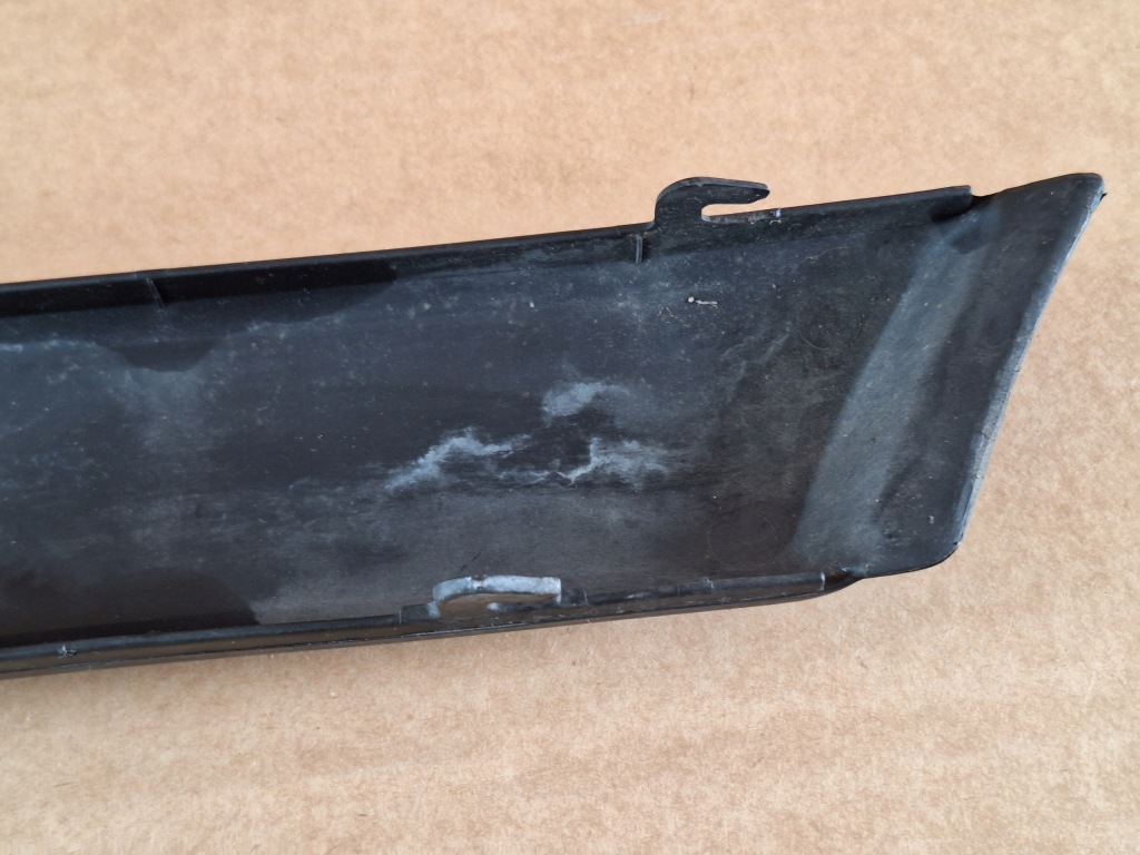 Купити Молдинг бампера заднього пластик czarna ліва bmw 5 e34 51121944185 oryg.