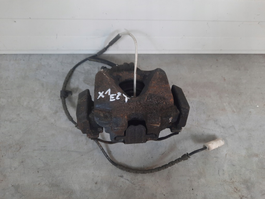 фото №1, Супорт гальмівний лівий перед bmw x1 e84