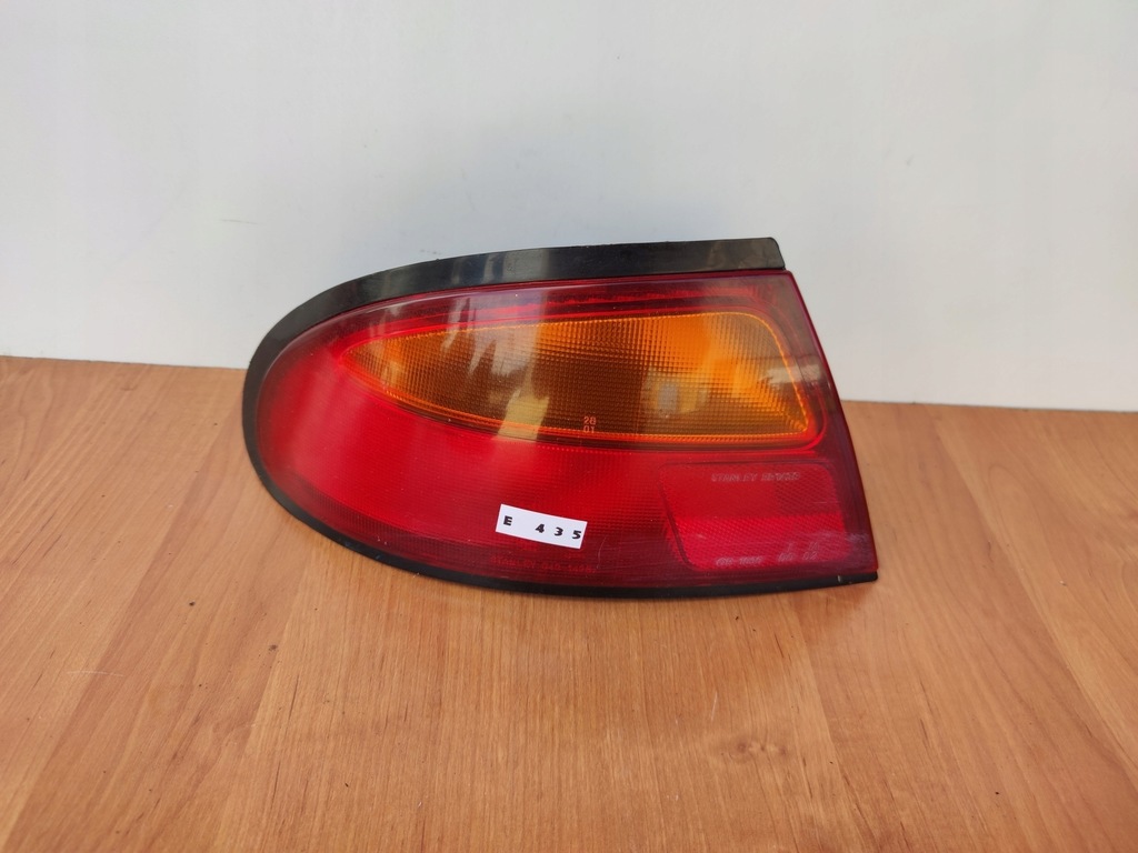 фото №1, Mazda 323 ba ліва лампа задня комплектна 94-98 rok lh