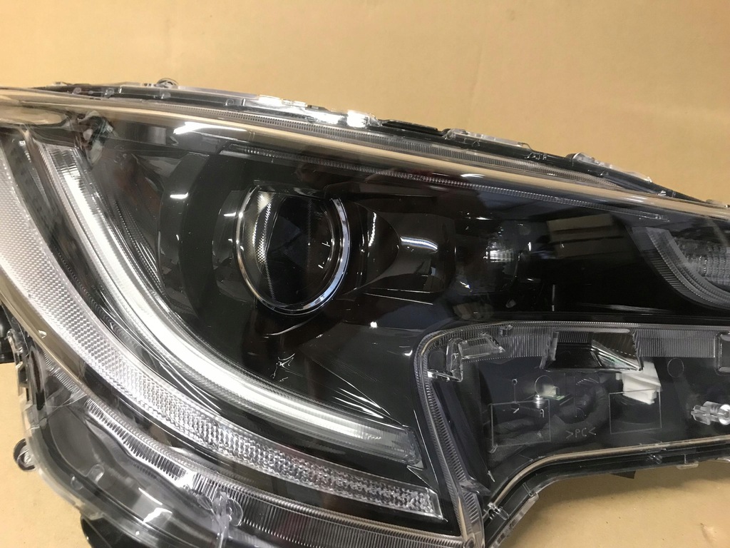 фото №10, Toyota corolla xii e21 комплект лампа перед