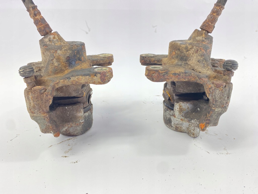 Суппорты тормозные тормоза задние задний  комплект  правый левый тормозные колодки mercedes w124 Оригинал