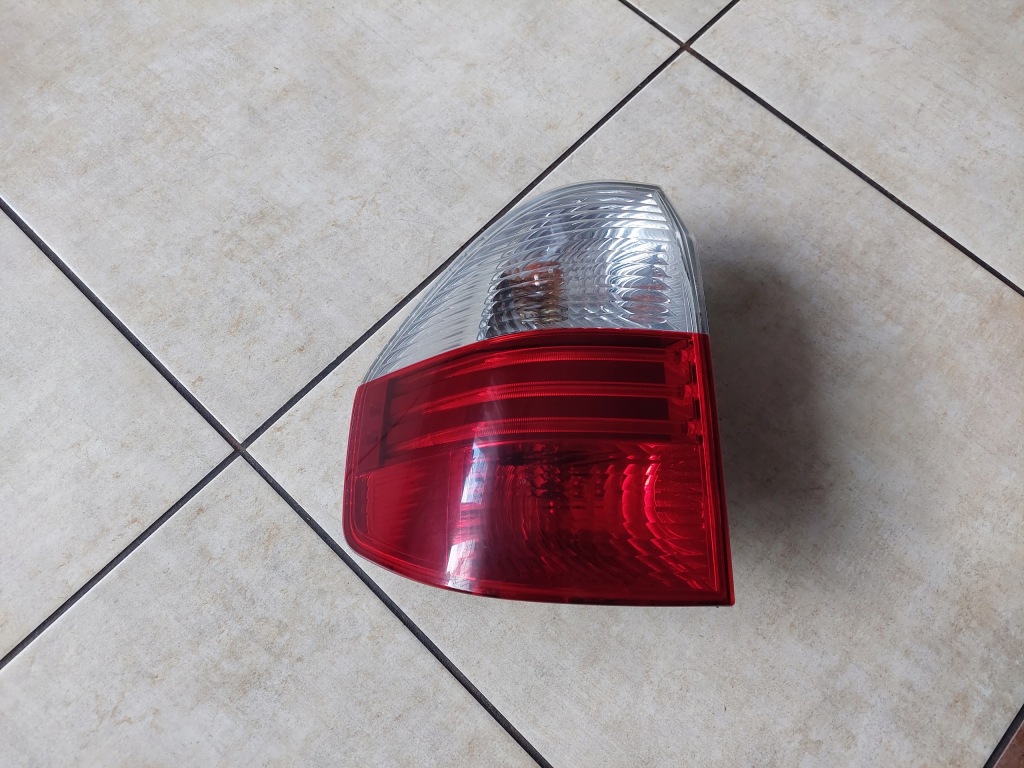 Купить Bmw оригинальный номер 7162209 фара