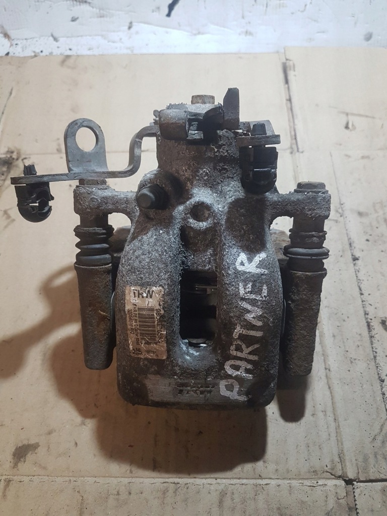 фото №1, Суппорт тормозной задняя левый peugeot partner iii