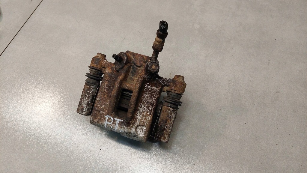 фото №7, Супорт гальмівний правий задня corolla e12 1.4 b