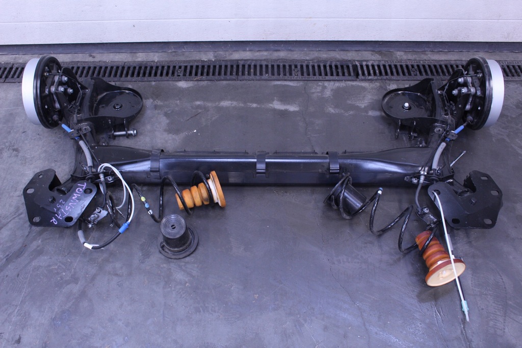 фото №1, Балка подвеска задняя nissan townstar 23r.